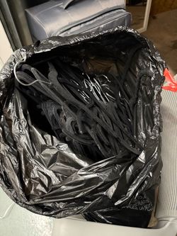 bag of black velvet hangers