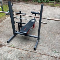 Bench Press With Barbell And Weight Rack