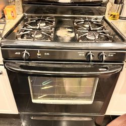 Used Black Kenmore oven