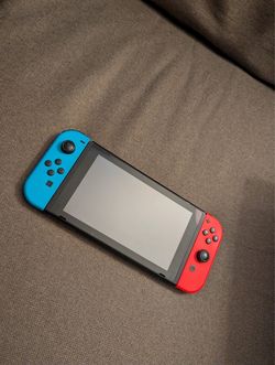 Nintendo Switch Neon Blue and Red with charger and case