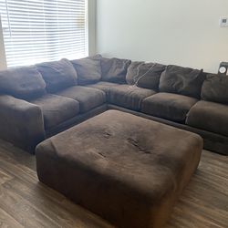 Huge sectional with Ottoman (slightly damaged but can be fixed!)