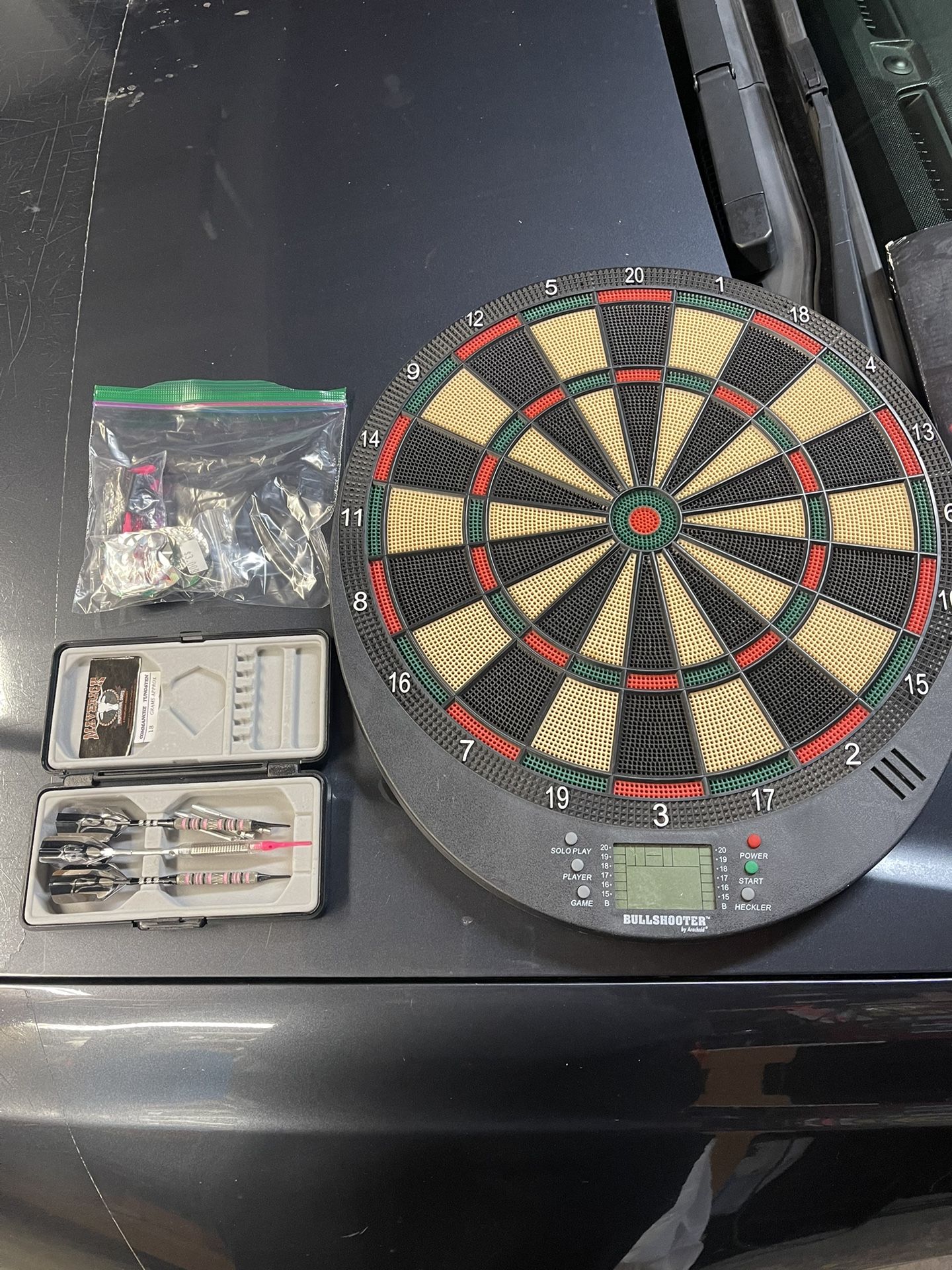 Dart Board With Darts