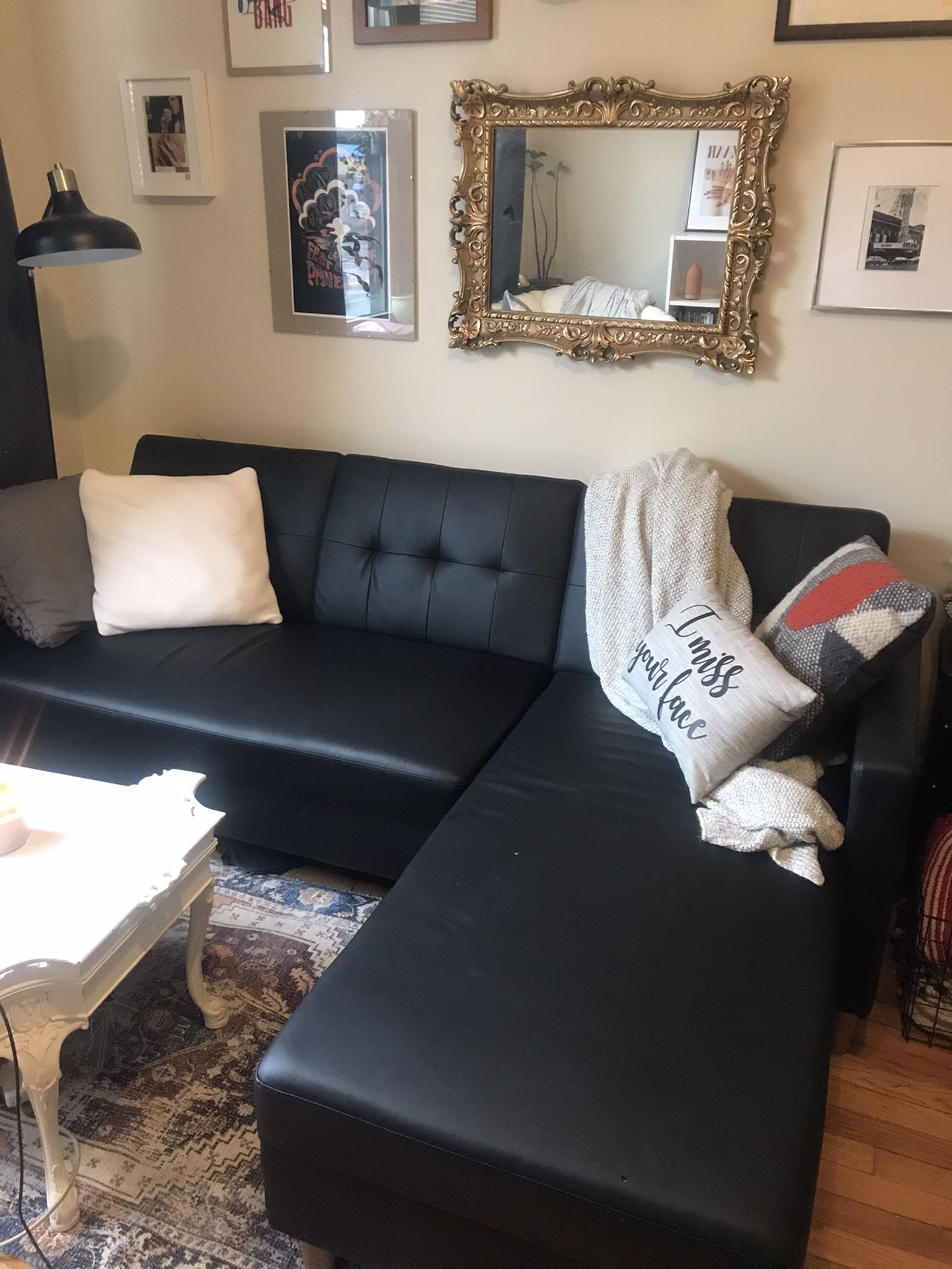 Black couch with storage space