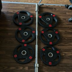 2     245lbs 2  35lbs And 2  25lbs With A Bar