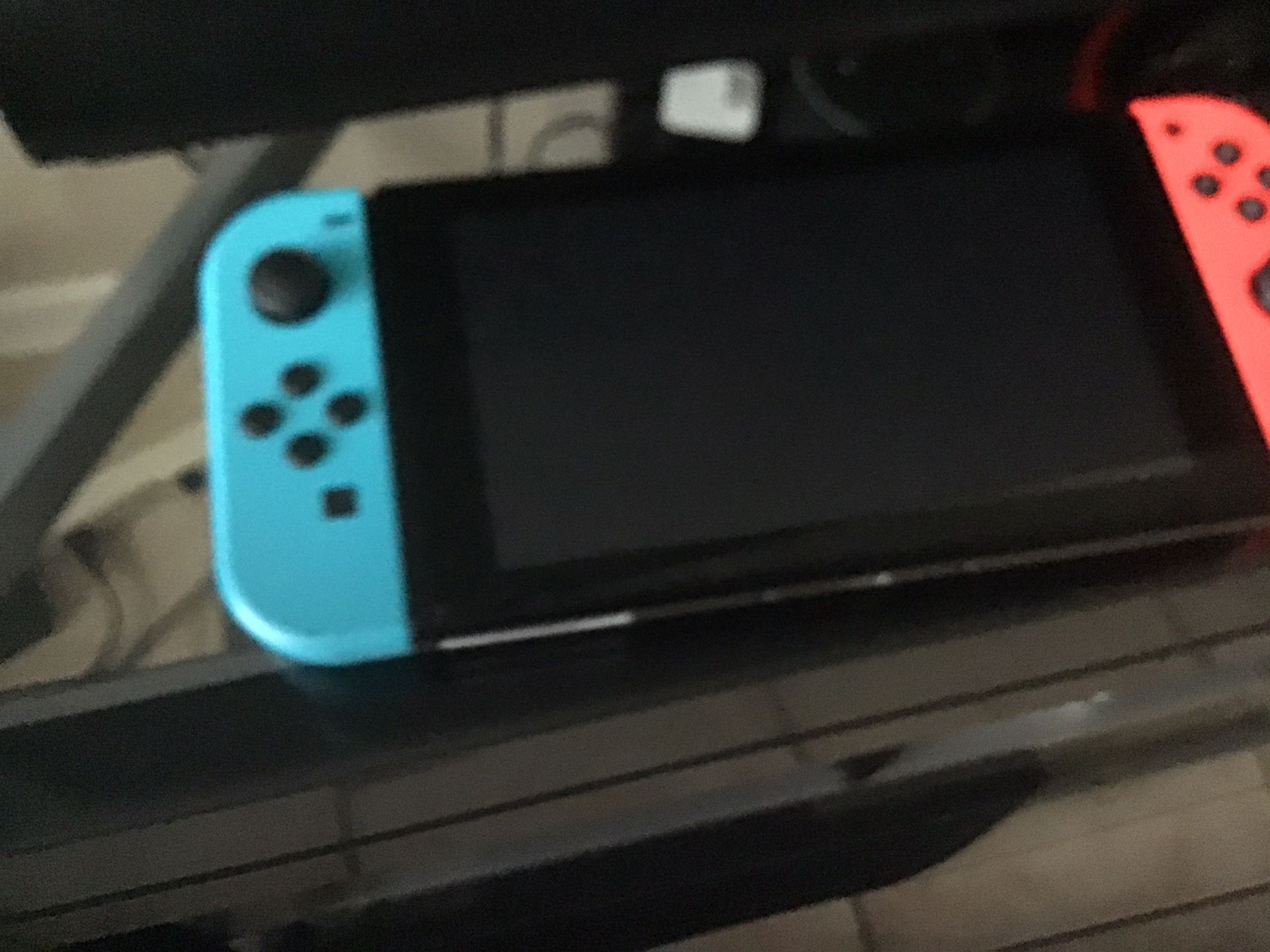 Nintendo switch new with tree games good conditions