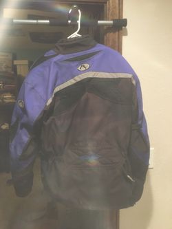Xl motorcycle jacket with back pad and elbow pads.