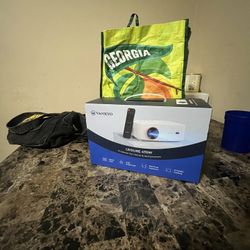 Vankyo Leisure 470W 720P Portable Projector with Wireless Connectivity: Adjustable Focus, HDMI Connection, 20000 Hour Bulb Life 