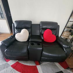 Black sofa and love seat