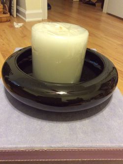 Black candle holder and pillar candle
