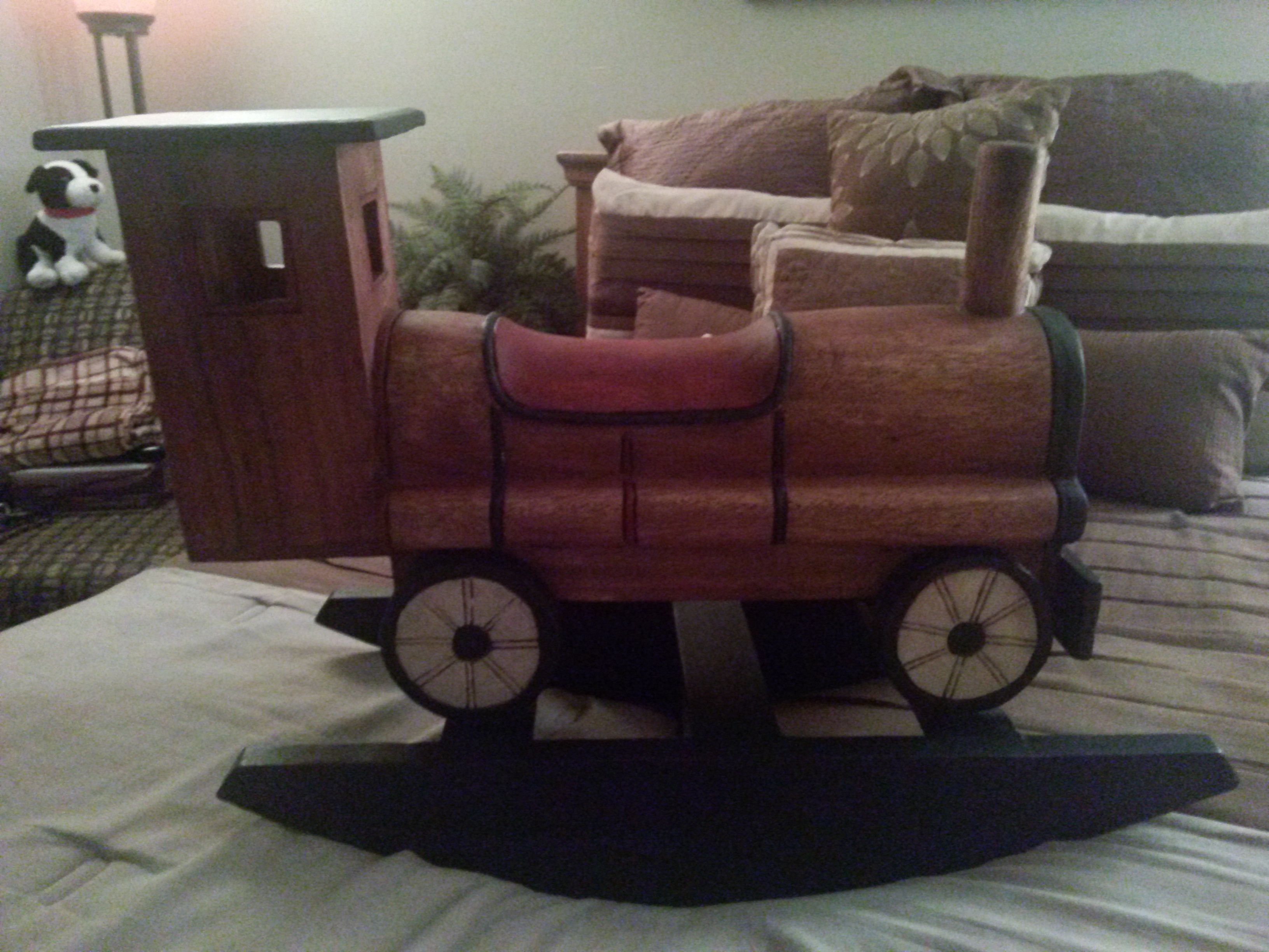 Antique hand carved child's rocker or a great decoration peice