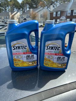 2 5quart Jugs of Motor Oil