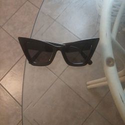 Woman's Sunglasses (Brand:midnight Hour.)