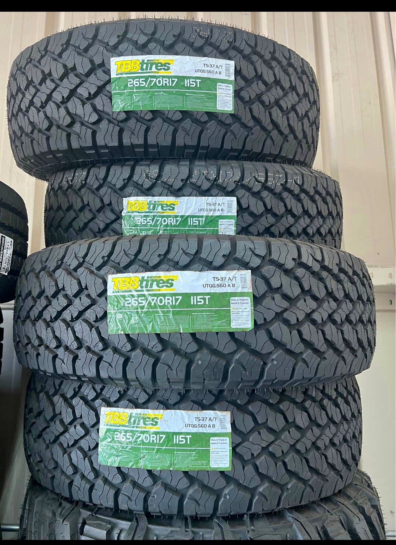 (4) P 265/70R17 TBB A/T TIRES