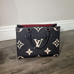 LOUIS VUITTON ON THE GO PURSE 