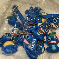 a dozen keychains Stitch