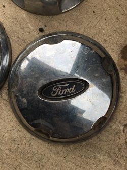 Ford Explorer center caps (make me an offer) and come get them