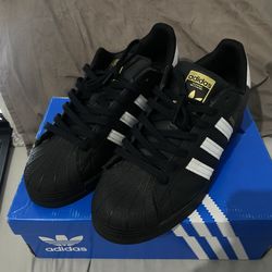 Black Adidas Superstars