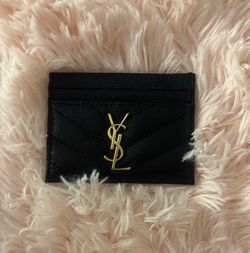 Black card holder with gold logo