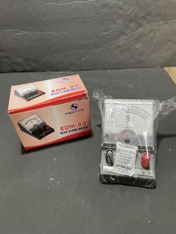 Supertek EDM-80 Moving Coil Desk Stand Meter   used for measuring electrical currents or voltages in educational settings or laboratories.     Type: A