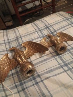 Metal eagles that go on the end of a pole