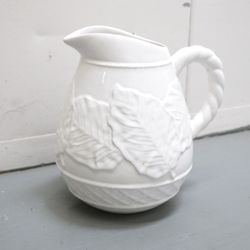 Antique watering pitcher for plants