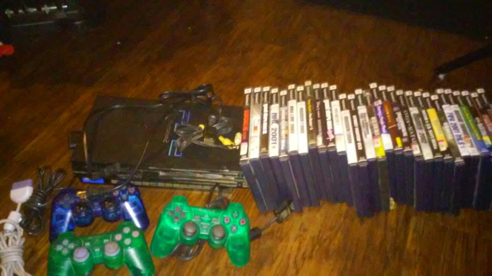 Playstation 2 with controllers and games