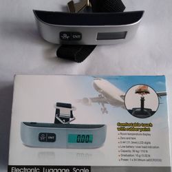 Electronic digital traveling luggage scale.