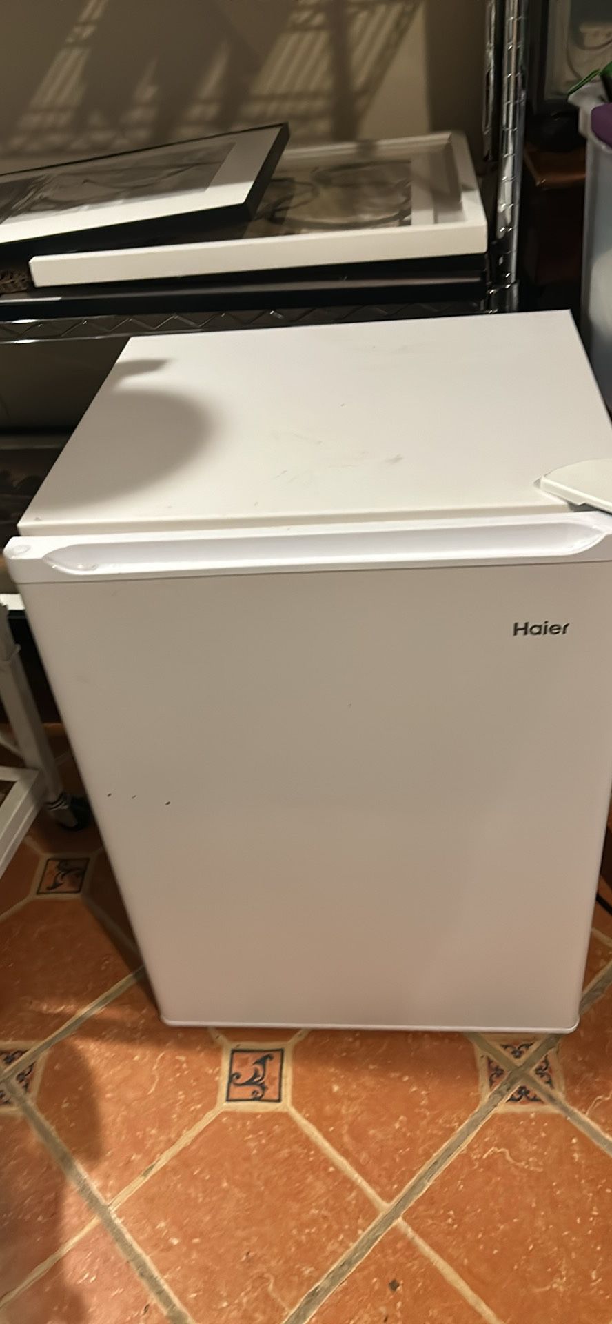 Haier Refrigerator , 26” tall , 19” wide , 16” deep 