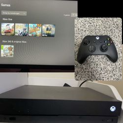 XBOX ONE X 1TB 2 CONTROLLERS & PRE INSTALLED GAMES