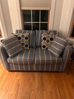 Denim blue and yellow love seat