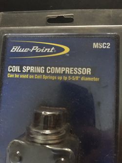 Coil spring compressor