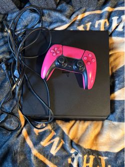 PS4 console and a ps5 controller