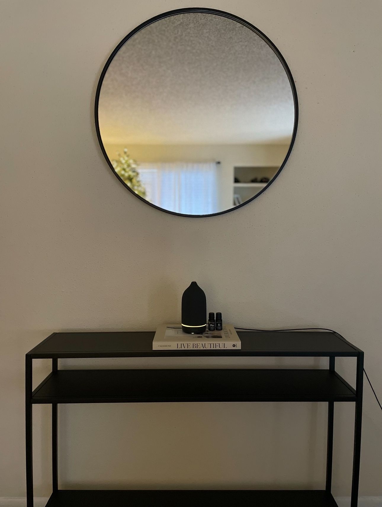 Round Black Framed Metal Wall Mirror