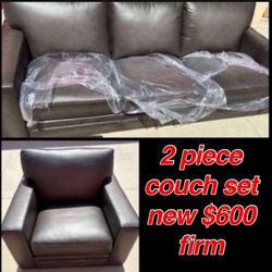 New Couch Set Gray Leather 2 pieces includes   1 three seater couch 1 single seater couch  I have the legs there still wrapped & sealed $600 firm no l