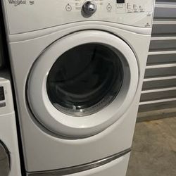 Front load whirlpool dryer electric with pedestal in excellent working condition extra for delivery same day delivery and installation available