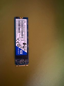 Western Digital WD Blue 3D NAND 1TB Internal SSD WDS100T2B0B-00YS70 featuring an M.2 2280 form factor and a SATA III 6Gb/s interface.