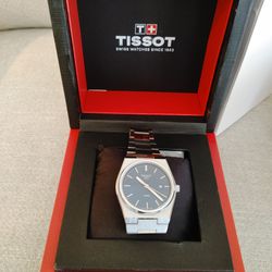 Tissot PRX watch blue face