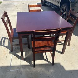 Table And Four Chairs