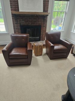 2 leather swivel chairs