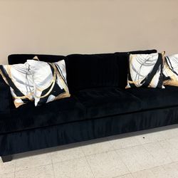 Black Sofa with Pillows