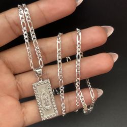 Figaro 22’ and mother Mary pendant