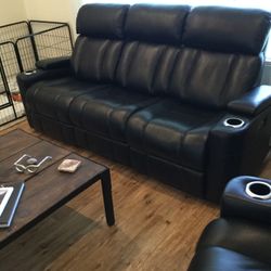 Leather electric sofa. Both ends recline. 