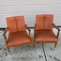 Pair Of Cool MCM Orange Vinyl Arm Chairs