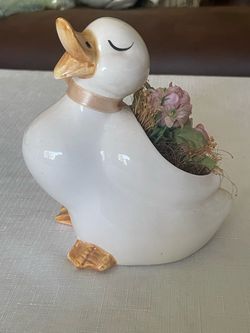 1970s vintage glazed ceramic duck novelty planter with a ribbon. Made in Japan
