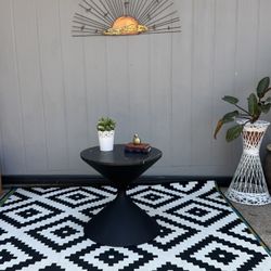 Used Time's Up Hourglass Shaped Side Table. 