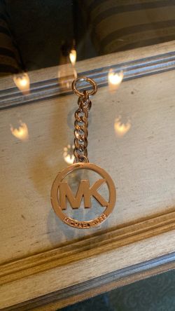 Michael Kors gold bag charm