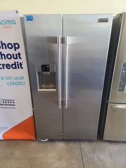 FRIGIDAIRE PROFESSIONAL STAINLESS STEEL SIDE BY SIDE REFRIGERATOR