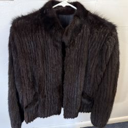 Brown vintage old french mink fur jacket with black lining. 