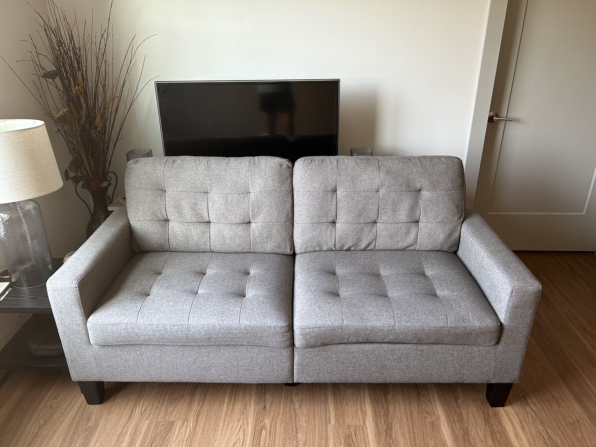 Gray Tufted loveseat