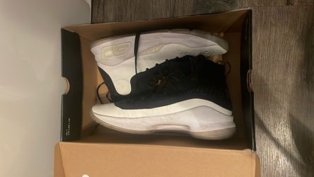 Curry 4 mid basketball shoe